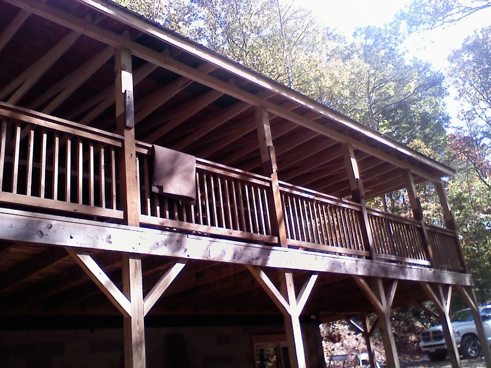 Timber framing under a new elevated porch and deck — Roof Leak Repair in Buffalo Prairie by Roofing Brothers